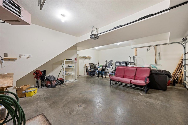 15377 Ridgeview Trl, Piedmont, SD 57783 - garage featuring a heating unit and a garage door opener