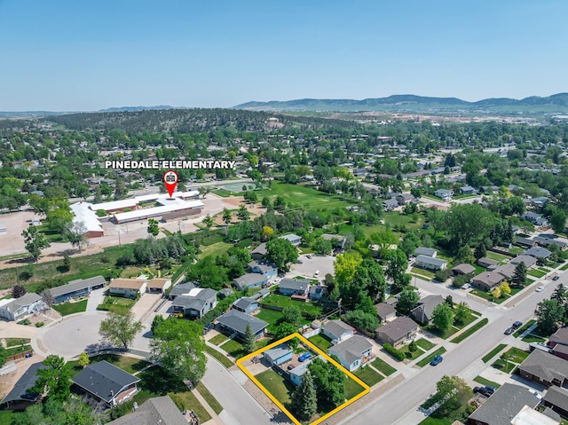 4902 Baldwin St, Rapid City, SD 57702 - aerial perspective of suburban area with property parcel outlined and mountains