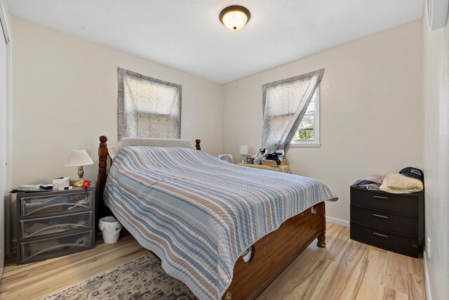4902 Baldwin St, Rapid City, SD 57702 - bedroom with wood finished floors and baseboards