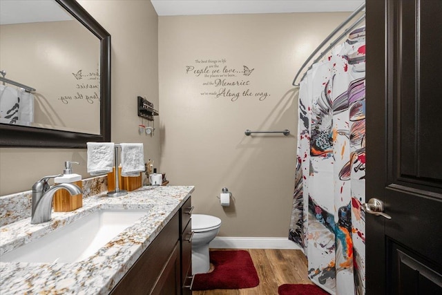 3781 W Beartooth Loop, Spearfish, SD 57783 - full bathroom with wood finished floors, vanity, and a shower with shower curtain