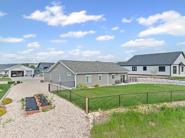 3781 W Beartooth Loop, Spearfish, SD 57783 - rear view of property featuring a garden