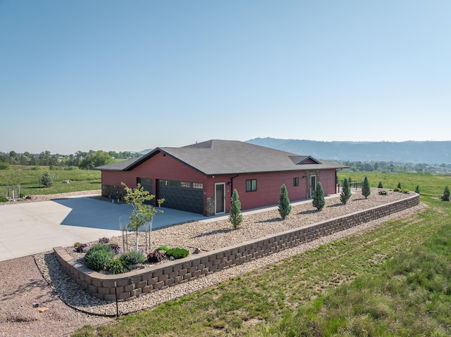 215 Meadowlark Dr, Hot Springs, SD 57747 - view of property exterior featuring concrete driveway and roof with shingles