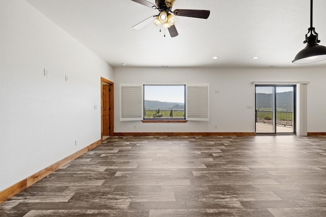215 Meadowlark Dr, Hot Springs, SD 57747 - unfurnished room with wood finished floors, ceiling fan, and recessed lighting