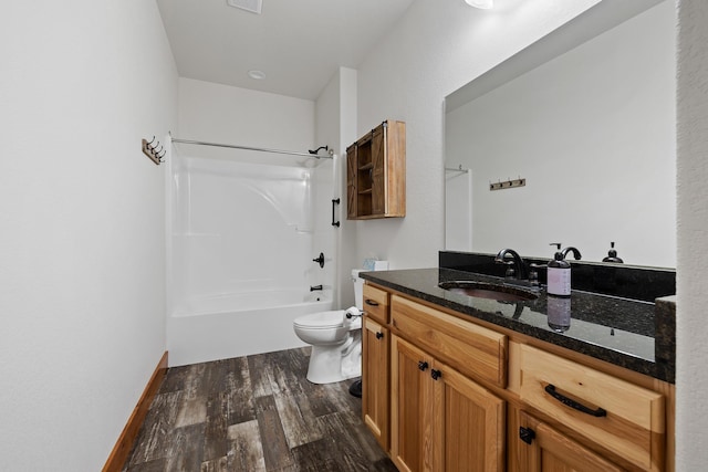 215 Meadowlark Dr, Hot Springs, SD 57747 - full bath with wood finished floors, vanity, and shower / washtub combination