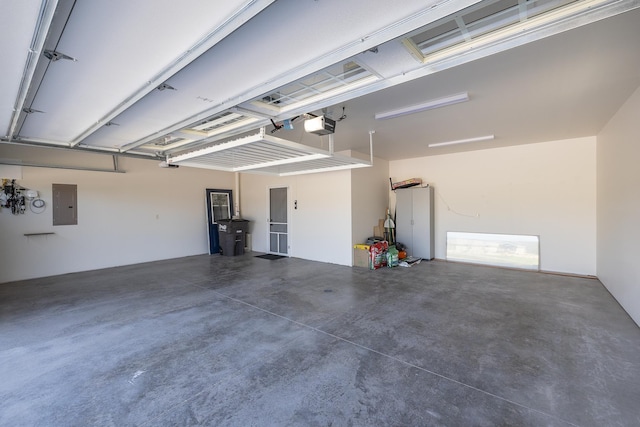 215 Meadowlark Dr, Hot Springs, SD 57747 - garage featuring electric panel and a garage door opener