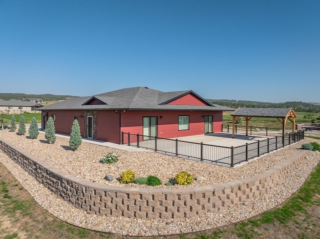 215 Meadowlark Dr, Hot Springs, SD 57747 - view of home's exterior featuring a gazebo, a patio area, and a shingled roof