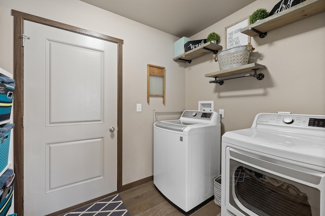 6315 Dunsmore Rd, Rapid City, SD 57702 - laundry room featuring independent washer and dryer and dark wood-type flooring