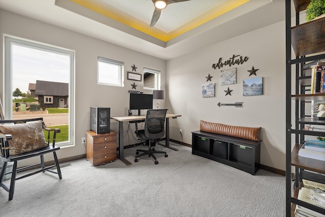 6315 Dunsmore Rd, Rapid City, SD 57702 - carpeted home office featuring a ceiling fan and a tray ceiling