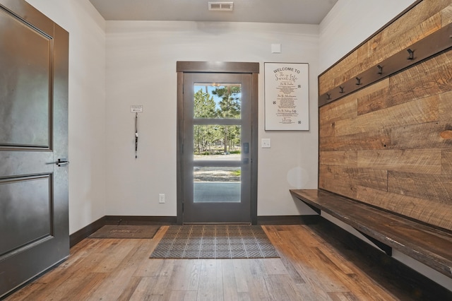 21332 Trailside Rd, Lead, SD 57754 - mudroom featuring wood finished floors and baseboards