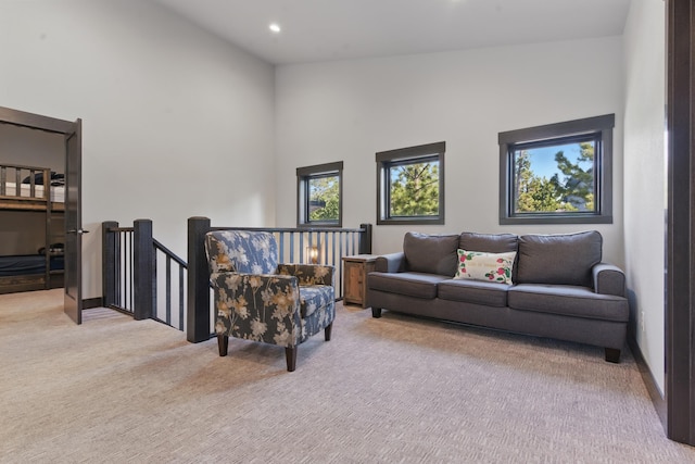 21332 Trailside Rd, Lead, SD 57754 - living area featuring carpet floors, recessed lighting, and a high ceiling
