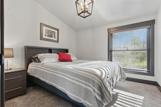 21332 Trailside Rd, Lead, SD 57754 - carpeted bedroom featuring vaulted ceiling and a chandelier