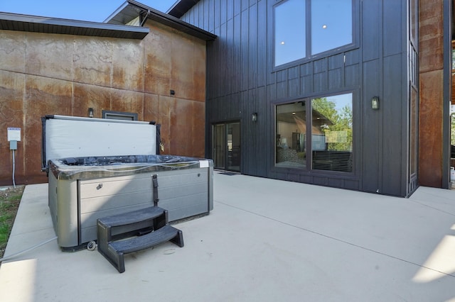 21332 Trailside Rd, Lead, SD 57754 - view of patio / terrace with a hot tub