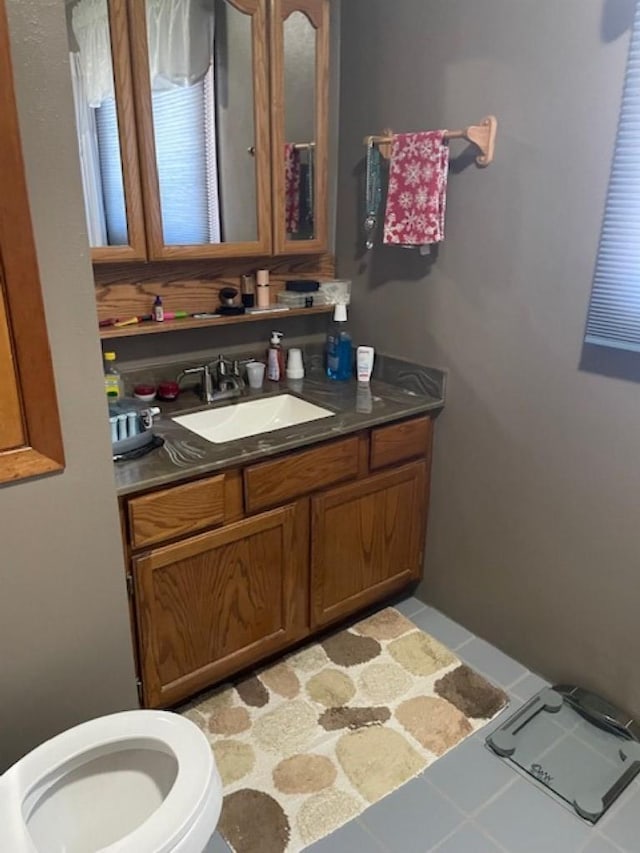 603 E 1st St, Buffalo, SD 57720 - bathroom with vanity and tile patterned flooring