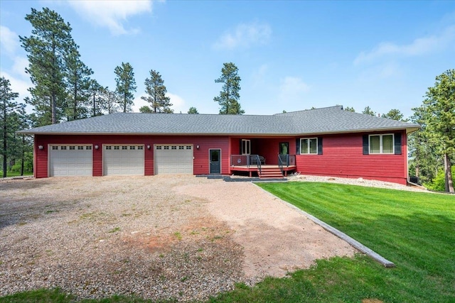 2040 Aster Rd, Spearfish, SD 57783 - ranch-style house with a front lawn, an attached garage, and driveway