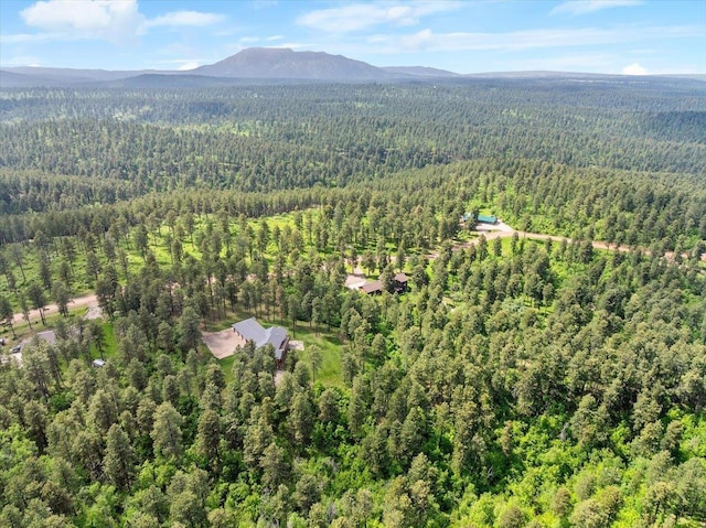 2040 Aster Rd, Spearfish, SD 57783 - aerial overview of property's location featuring a heavily wooded area and mountains
