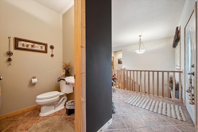 2040 Aster Rd, Spearfish, SD 57783 - bathroom with toilet and tile patterned floors