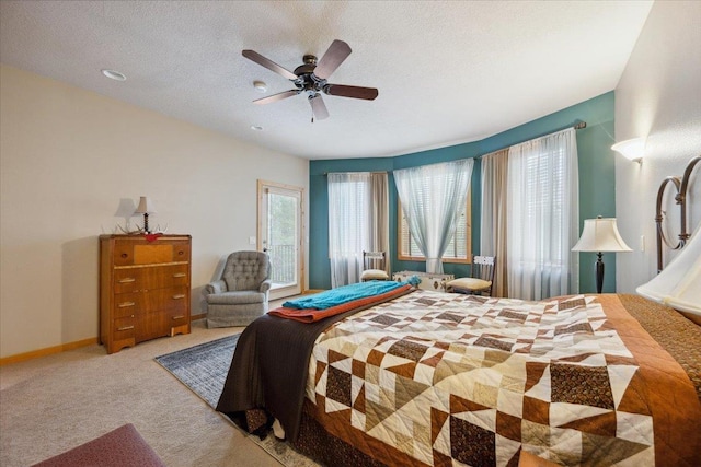 2040 Aster Rd, Spearfish, SD 57783 - bedroom with carpet floors, a ceiling fan, and a textured ceiling