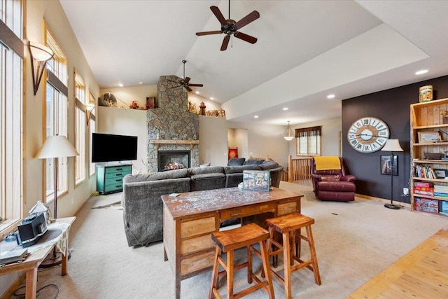 2040 Aster Rd, Spearfish, SD 57783 - living area with ceiling fan, plenty of natural light, recessed lighting, a stone fireplace, and wood finished floors