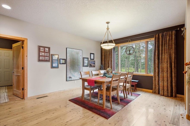2040 Aster Rd, Spearfish, SD 57783 - dining area with light wood-style flooring