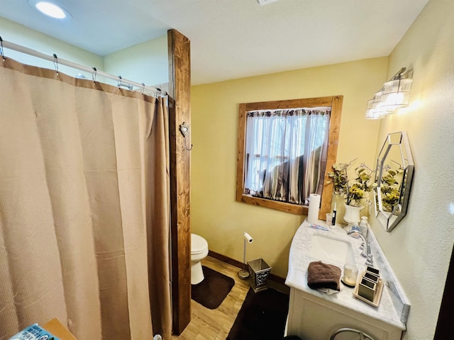 417 Spark St, Lead, SD 57754 - bathroom featuring wood finished floors, vanity, and a shower with curtain
