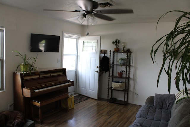 126 E Saint Andrew St, Rapid City, SD 57701 - living area with ceiling fan and dark wood-type flooring