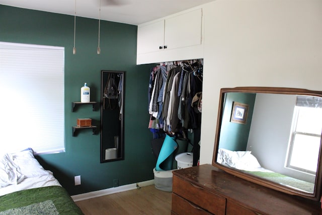 126 E Saint Andrew St, Rapid City, SD 57701 - bedroom with wood finished floors and multiple windows