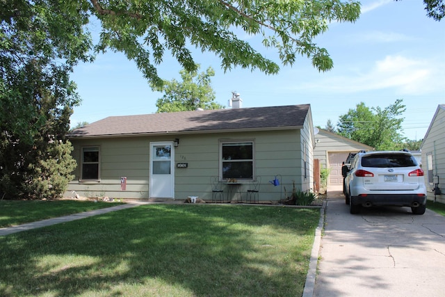 126 E Saint Andrew St, Rapid City, SD 57701 - bungalow with a front yard and a chimney