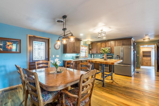 627 W Mt Rushmore Rd, Custer, SD 57730 - dining room with light wood-style floors