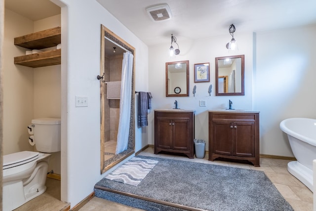 627 W Mt Rushmore Rd, Custer, SD 57730 - bathroom with a stall shower, vanity, and a freestanding bath