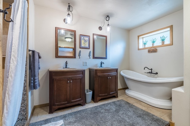 627 W Mt Rushmore Rd, Custer, SD 57730 - bathroom with two vanities, a freestanding tub, tile patterned floors, and curtained shower