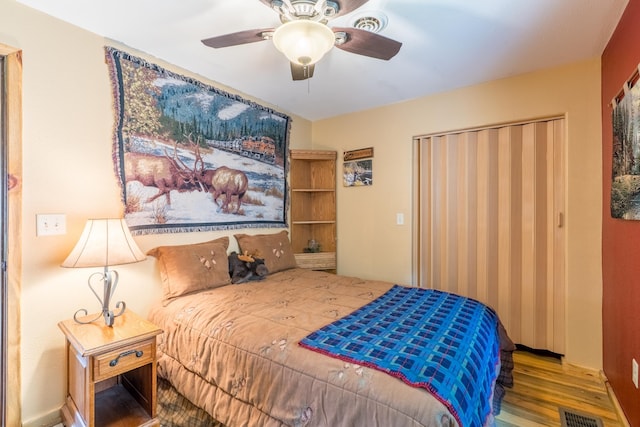 627 W Mt Rushmore Rd, Custer, SD 57730 - bedroom featuring wood finished floors and a ceiling fan