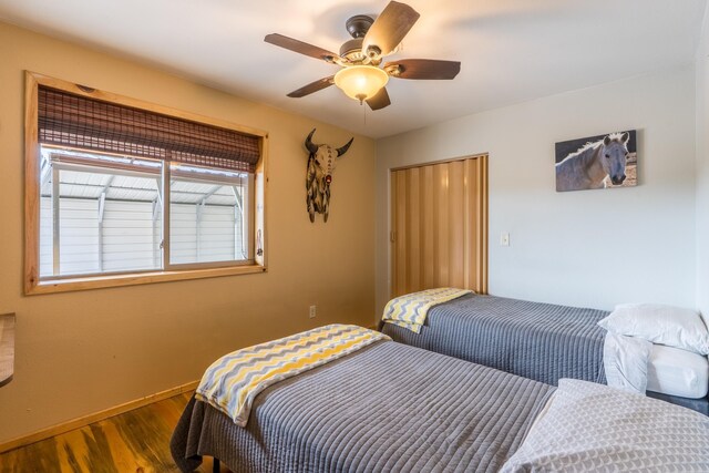 627 W Mt Rushmore Rd, Custer, SD 57730 - bedroom featuring wood finished floors and a ceiling fan