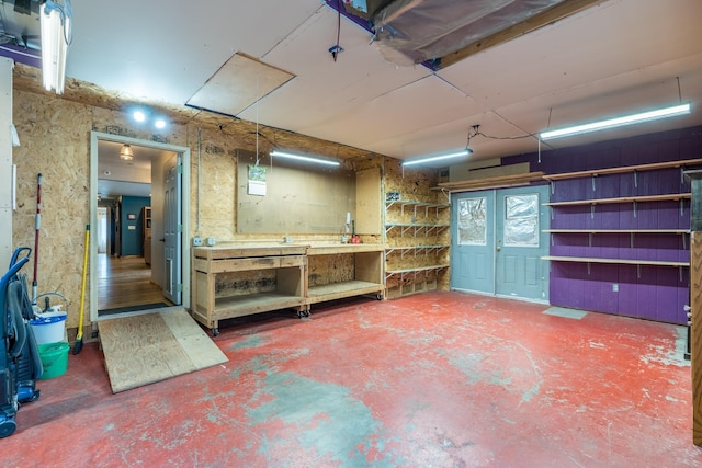 627 W Mt Rushmore Rd, Custer, SD 57730 - miscellaneous room with a workshop area and unfinished concrete flooring