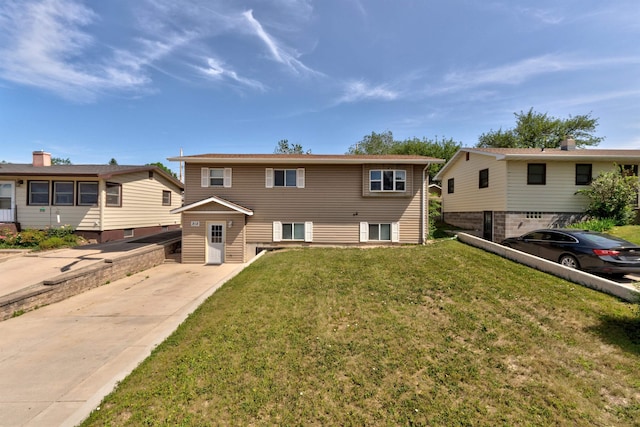 212 E Custer St, Rapid City, SD 57701 - view of front of home with a front lawn and concrete driveway