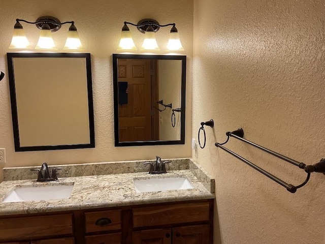 772 Stage Run Rd, Deadwood, SD 57732 - full bathroom featuring double vanity and a textured wall
