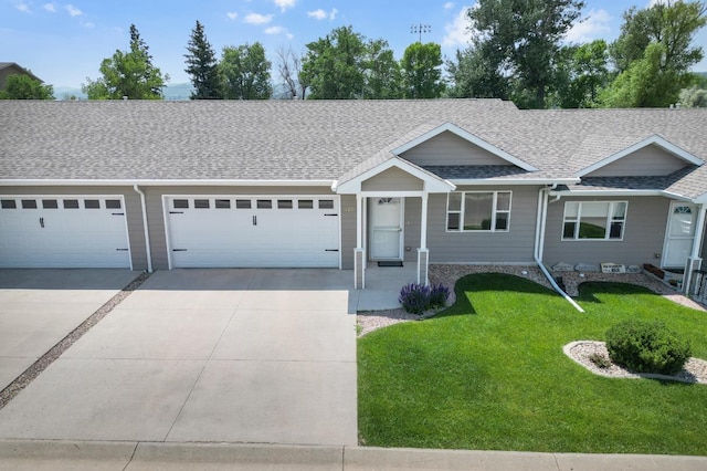 1205 Silverbrook Ln, Spearfish, SD 57783 - single story home featuring concrete driveway, a shingled roof, an attached garage, and a front lawn