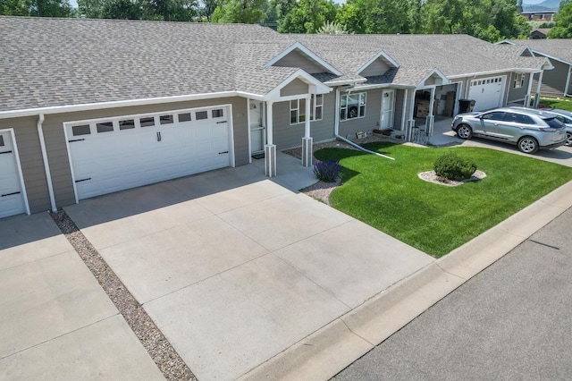 1205 Silverbrook Ln, Spearfish, SD 57783 - ranch-style home featuring concrete driveway, an attached garage, a front lawn, and a shingled roof