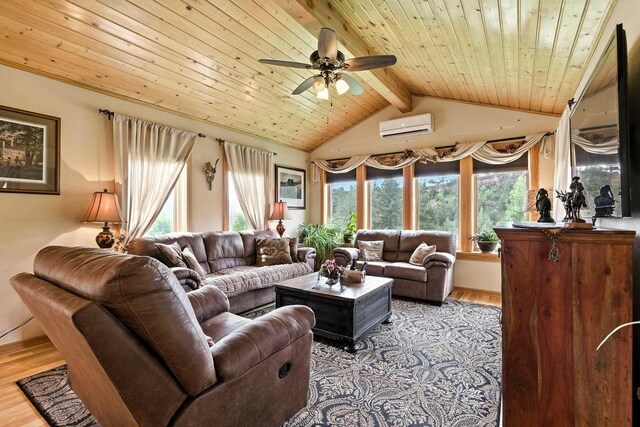 12817 Echo Rd, Hot Springs, SD 57747 - living room featuring a wall unit AC, a ceiling fan, light wood finished floors, and wooden ceiling