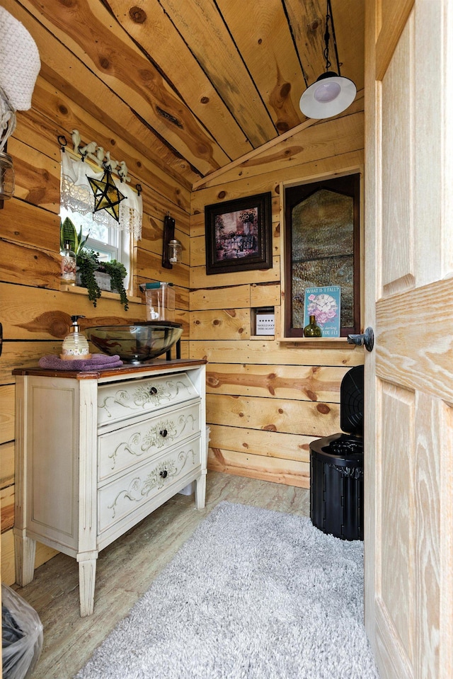 12817 Echo Rd, Hot Springs, SD 57747 - sitting room featuring vaulted ceiling, wooden walls, light wood finished floors, and wood ceiling