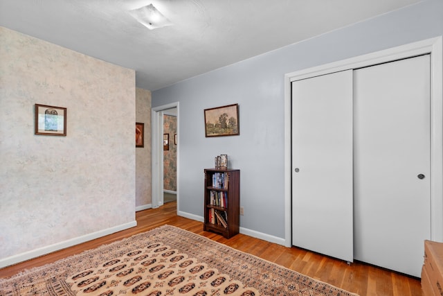 4103 W Main St, Rapid City, SD 57702 - bedroom featuring wood finished floors and a closet