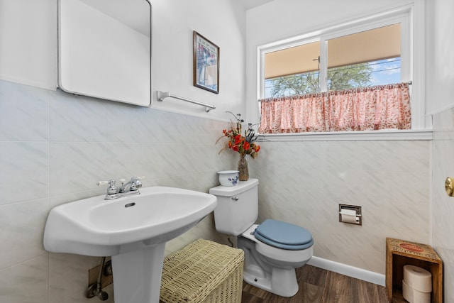4103 W Main St, Rapid City, SD 57702 - bathroom with tile walls and wood finished floors