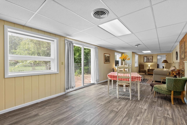 4103 W Main St, Rapid City, SD 57702 - dining room featuring a drop ceiling, wood finished floors, and healthy amount of natural light