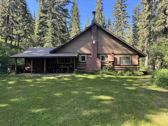 21454 US Highway 85, Lead, SD 57754 - back of property featuring a yard and log exterior