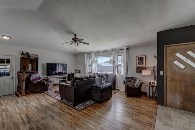 505 Fisk Ave, Newell, SD 57760 - living area with a ceiling fan, light wood-style flooring, and a textured ceiling