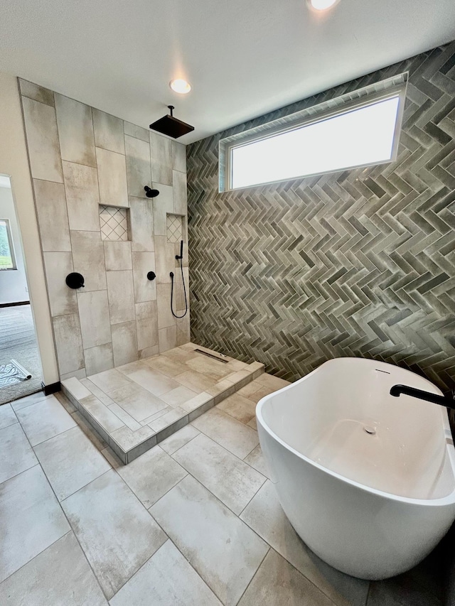 25809 Sidney Trl, Custer, SD 57730 - bathroom featuring a soaking tub and a tile shower