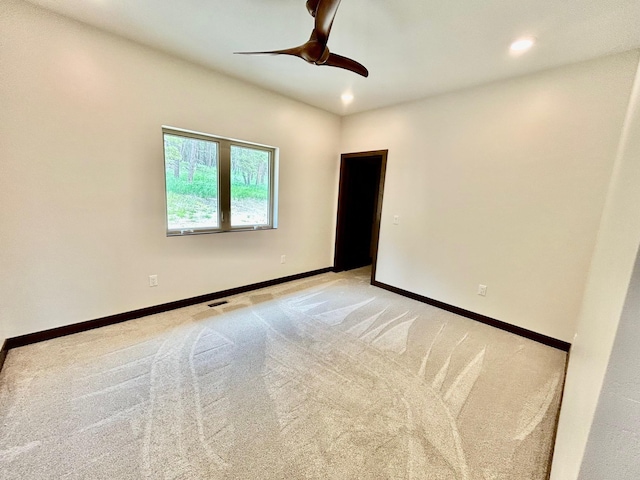 25809 Sidney Trl, Custer, SD 57730 - empty room with a ceiling fan, light colored carpet, and recessed lighting