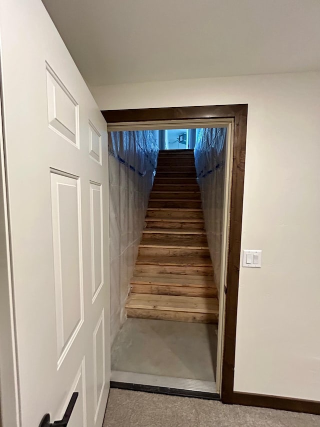25809 Sidney Trl, Custer, SD 57730 - staircase featuring concrete floors and baseboards