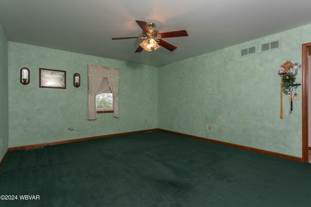 carpeted empty room with ceiling fan