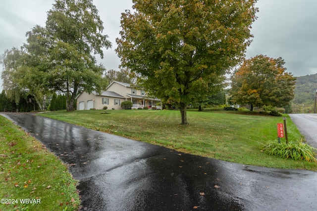 view of front of home with a front yard