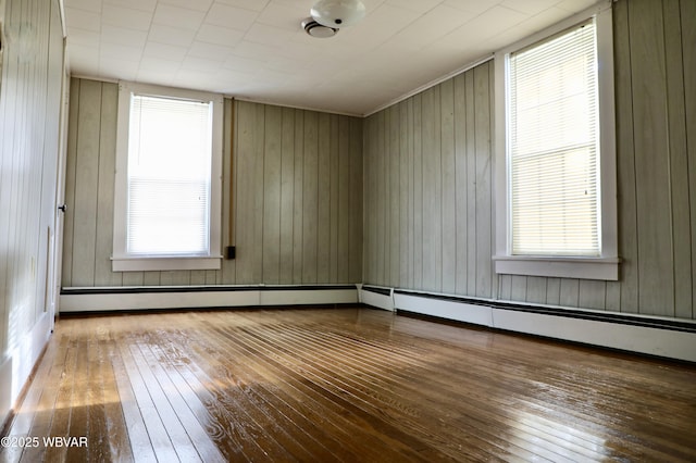 unfurnished room featuring wood-type flooring